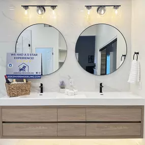 Ledezma Remodeling transformed this space with a sleek double vanity, modern lighting, and stylish finishes—bringing luxury and efficiency to this bathroom renovation. Every detail was designed for both beauty and practical use.