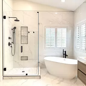 This elegant walk-in shower and freestanding tub combo showcases the expert craftsmanship of Ledezma Remodeling. It’s a perfect example of a custom shower remodel that elevates daily routines into spa-like experiences.