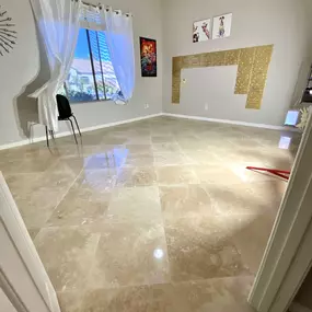 This beautiful space features newly installed travertine flooring, which adds a natural warmth and a smooth, refined finish. Ledezma Remodeling brought fresh life to the room with this home remodeling update, creating a clean and inviting foundation that complements any style. The result is a space that feels open, polished, and thoughtfully designed.