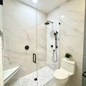 Ledezma Remodeling transformed this space with a refined bathroom remodeling that feels both modern and inviting. The shower features bold matte black fixtures, a clean glass enclosure, and elegant tilework that brings the whole design together. From layout to final renovation touches, every element is designed to elevate daily comfort.