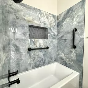 Ledezma Remodeling brings craftsmanship and care into every corner of this beautifully updated bath space. With rich, textured tile and sleek black fixtures, this project is a great example of how thoughtful home remodeling can completely refresh a room. The result is clean, calming, and built to last.