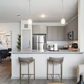 Kitchen and dining room with garage access at Camden Leander apartments in Leander, Tx