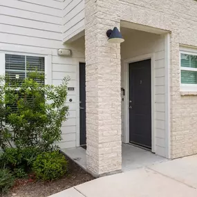 Exterior entry front doors at Camden Leander apartments in Leander, Tx