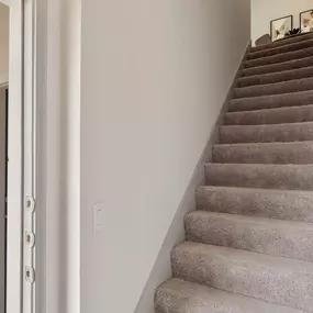 Private staircase entry to second-floor home at Camden Leander apartments in Leander, Tx