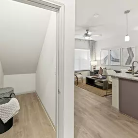 First-floor kitchen and living room with spacious under-stairs storage closet at Camden Leander apartments in Leander, Tx