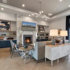 Resident lounge with fireplace and seating at Camden Leander apartments in Leander, Tx