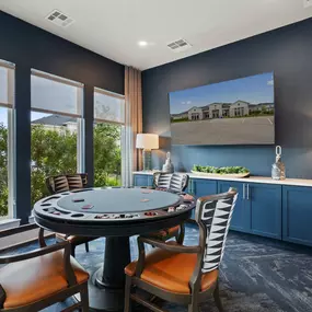 Poker lounge with poker table and tv at Camden Leander apartments in Leander, Tx