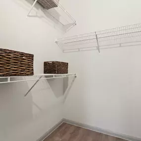 Walk-in closet with wire shelves at Camden Leander apartments in Leander, Tx