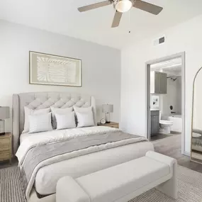 Bedroom with ensuite and wood-style floors at Camden Leander apartments in Leander, Tx
