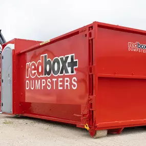 Construction site delivery: Patented port-a-potty dumpster combo.