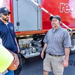 redbox+ Dumpsters driver talking to clients