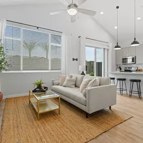 a living room with a couch and a table