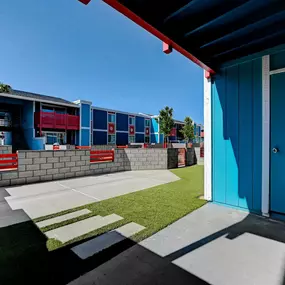A blue door is on the right side of the image