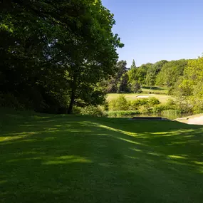 Beauchief Golf Course in Sheffield features tree-lined fairways and rolling parkland set against a scenic countryside backdrop.
