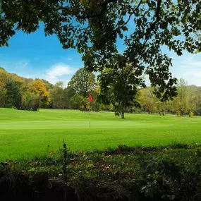 Beauchief Golf Course in Sheffield features tree-lined fairways and rolling parkland set against a scenic countryside backdrop.