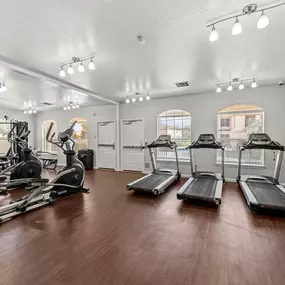 A modern fitness gym at Huntington Meadows Apartments in Austin with high-quality exercise equipment.