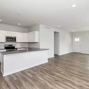 Spacious kitchen with decorative light fixtures