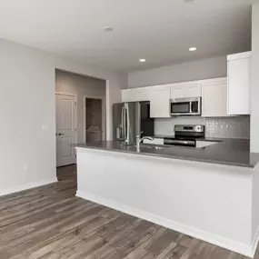 Kitchen with decorative light fixtures