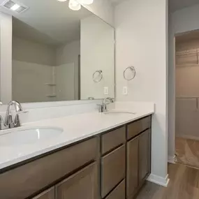 Bathroom with large mirror