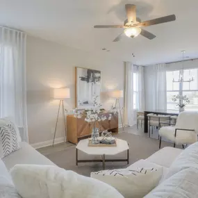 Comfortable living room with natural light throughout.