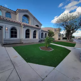 Stunning front yard transformation with elegant pavers, lush greenery, and a clean, modern design. Ideal for homeowners looking to upgrade their outdoor space with professional landscaping solutions.