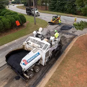 aerial view of magnum paving employee on milling machine