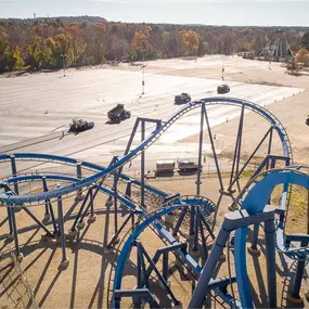 magnum paving working in a six flags parking lot