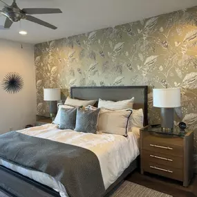 At The Wallpaper Co., we love bringing spaces to life with beautiful designs! This elegant botanical wallpaper adds warmth and character, creating a cozy yet sophisticated feel in this bedroom. If you're looking for designer wallpaper in Phoenix, we’re here to help you find the perfect style for your space!