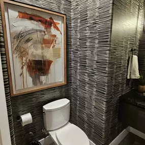 The Wallpaper Co. brings striking style to even the smallest spaces, as seen in this bold and modern powder room makeover. The rich texture and movement of the design make it a true focal point. This is the kind of elevated look that shows why we are a top choice for wallcoverings in Arizona.