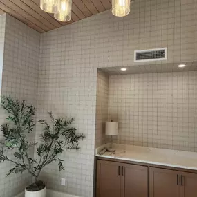 This serene, modern space is the perfect example of how subtle texture can completely elevate a room. The Wallpaper Co. delivered just the right balance of warmth and style with this refined wall finish. As a trusted wallpaper dealer, we offer expert guidance and premium selections that bring every vision to life.