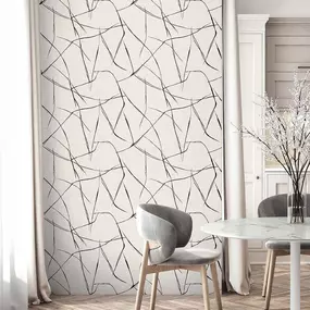 The Wallpaper Co brings effortless style into every space with expert wallpaper installation that makes a statement. This modern, abstract pattern adds a sense of movement and sophistication to the room, perfectly paired with soft tones and natural textures. It's the kind of transformation that turns plain walls into a polished backdrop for daily life.