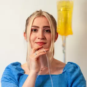 Young woman receiving mobile IV therapy in Los Angeles for hydration and wellness.