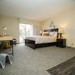 A cozy bedroom at Passenger Flats in Chattanooga with a simple and inviting design.