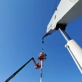 Precision equipment — a close-up of our crane in action during a structural lift.