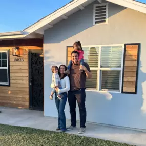 The moreno family on their first day as homeowners in Bloomington!