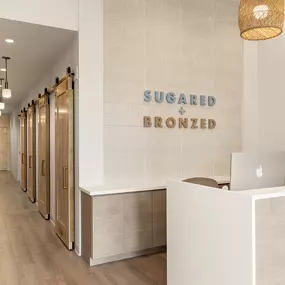 SUGARED + BRONZED Huntington Beach reception desk