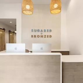 SUGARED + BRONZED Huntington Beach reception desk