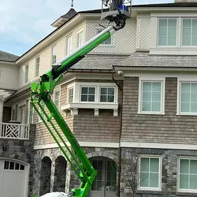 Our expert team utilizes a specialized lift to access and paint hard-to-reach locations, ensuring that we can work on the largest structures safely and effectively.