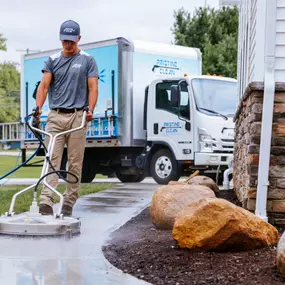 Pristine Clean Employee Concrete Pressure Washing and Sealing