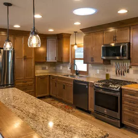 ZimmTown Construction’s kitchen remodel combines style and efficiency with sleek cabinetry, high-end countertops, and modern fixtures. Upgraded lighting, durable flooring, and smart storage maximize space, creating a beautiful, functional kitchen for everyday living.