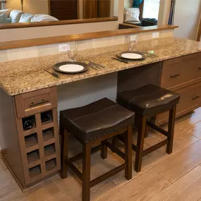 ZimmTown Construction’s kitchen remodel features a stylish breakfast bar, perfect for casual dining and entertaining. With sleek countertops, custom cabinetry, and modern lighting, the space blends function and elegance, creating a warm, inviting atmosphere.