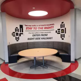 Here's another example of what decals can do. We added this sign inside Princeton Community Middle School. It describes the hallway traffic patterns inside the school. It was pretty complicated, but we were able to use separate decals to get all the information on the wall. if you have a complicated need that involves signs, we can help. Visit our Facebook page to see what we can do.