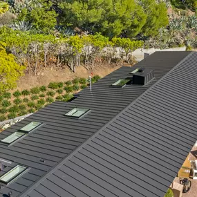 Matte Black Standing Seam Metal Roof Installation