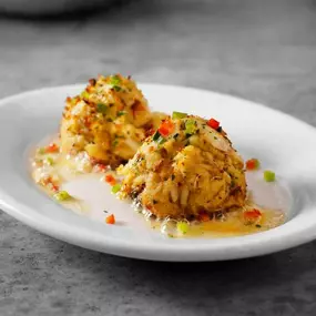 SIZZLING CRAB CAKES - two jumbo lump cakes, lemon butter