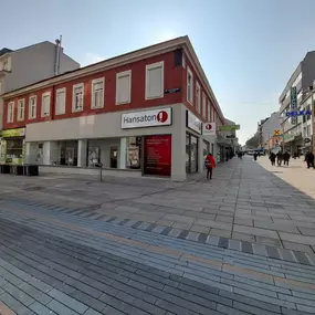 Hansaton Hörkompetenz-Zentrum Meidlinger Hauptstraße 37, Top1, Wien Meidling von der gegenüberliegenden Straßenseite kommend