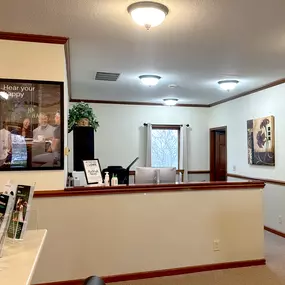 Interior photo of the reception desk of the AudioNova hearing clinic in Fort Wayne, IN