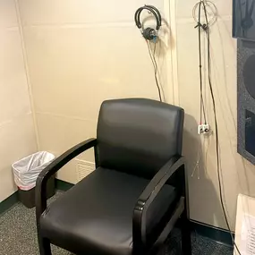 Interior photo of the hearing testing booth in the AudioNova hearing clinic in Fort Wayne, IN