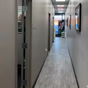 Interior photo of the hallway for AudioNova hearing clinic in Fairview Park, OH