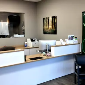 Interior photo of the reception desk for AudioNova hearing clinic in Fairview Park, OH