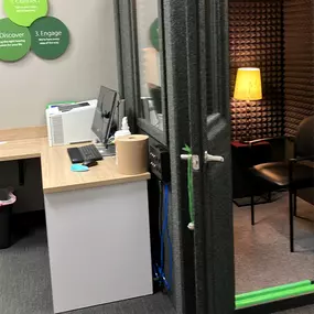 Interior photo of the sound-proof hearing exam booth for AudioNova hearing clinic in Fairview Park, OH